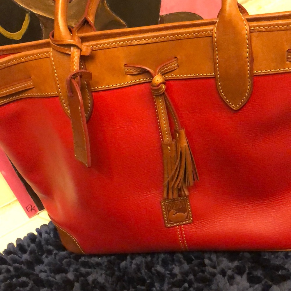 Red and tan Dooney and Bourke